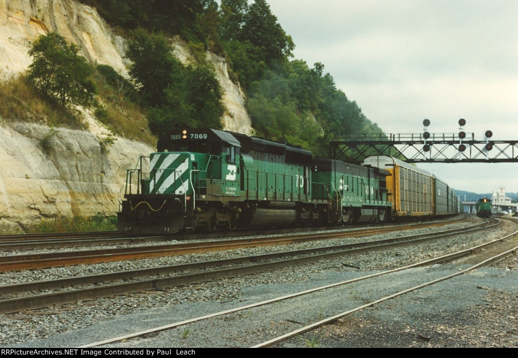 Vehicle train rolls west